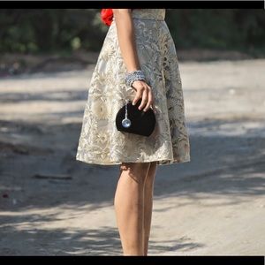 Intricate custom - made gold embroidered flare skirt